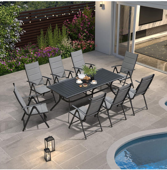 Juego de comedor 9 piezas aluminio gris.