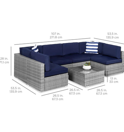 Pre-venta modular 7 piezas mimbre gris cojines azul marino con mesa cuadrada con cristal.