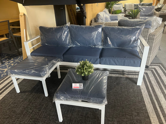 Mueble aluminio blanco con cojines azul 3 piezas.