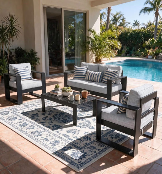 Juego de muebles de aluminio moderno de 4 piezas color negro cojines gris.